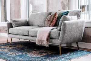 designer grey sofa with cushions
