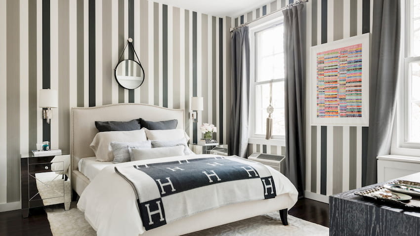 bedroom with decorative wallpaper