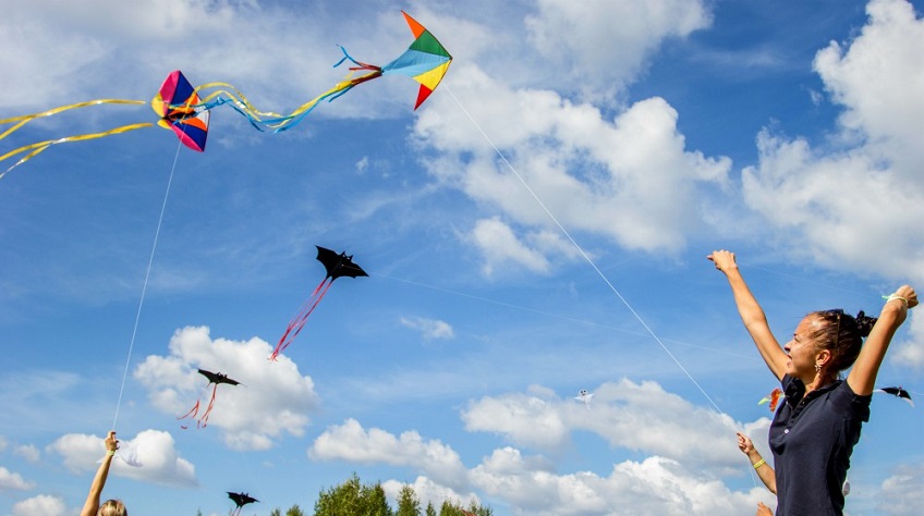 girl flying kite