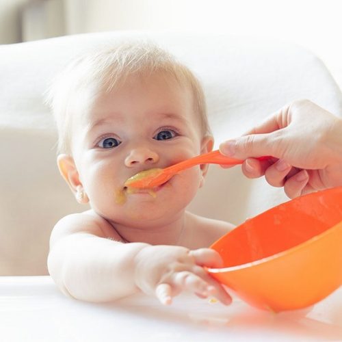 Kid Eating From Baby Bowl