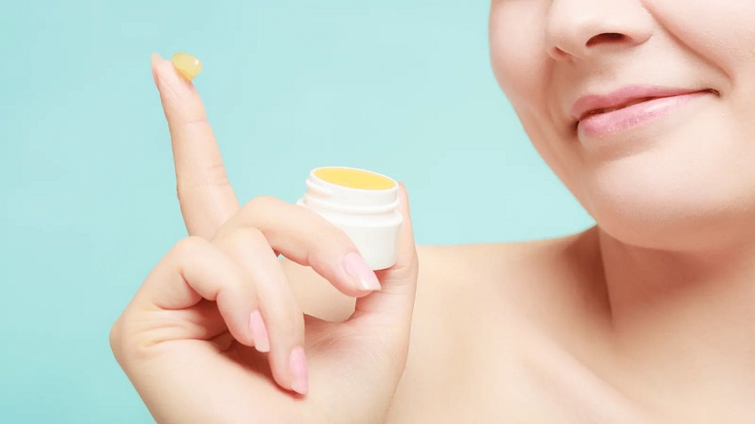 picture of a person holding a petroleum jelly 