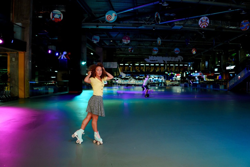 picture of a woman on roller skates in a hall 