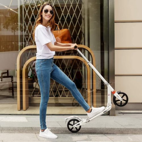 girl with a white commuter scooter