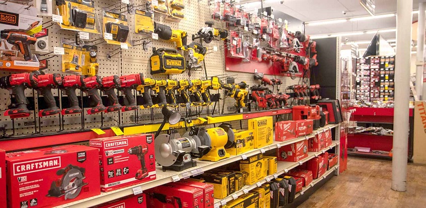Close-up of power tools on a shelves in a tool shop