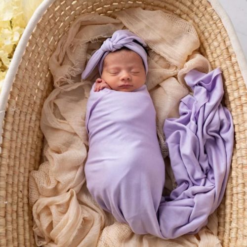 newborn in a swaddle