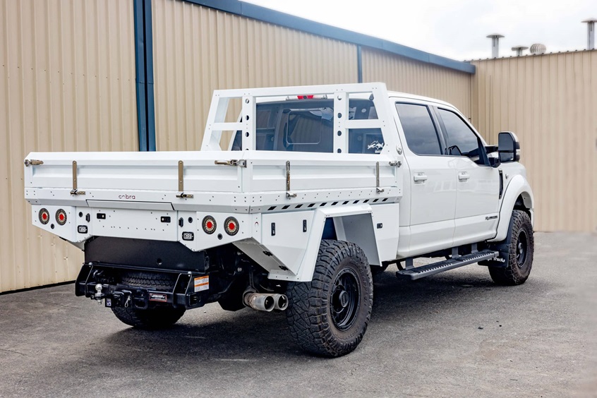 A white truck with ute accessories