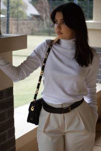 woman wearing white turtleneck long sleeve top