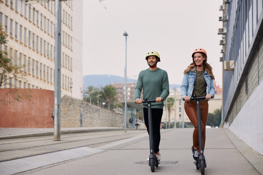 people on a electric scooters